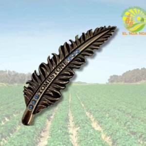 PLUMA METALICA ORO PINTADO PIEDRA AZUL ACCESORIO OPARA SOMBTRERO TOMBSTON